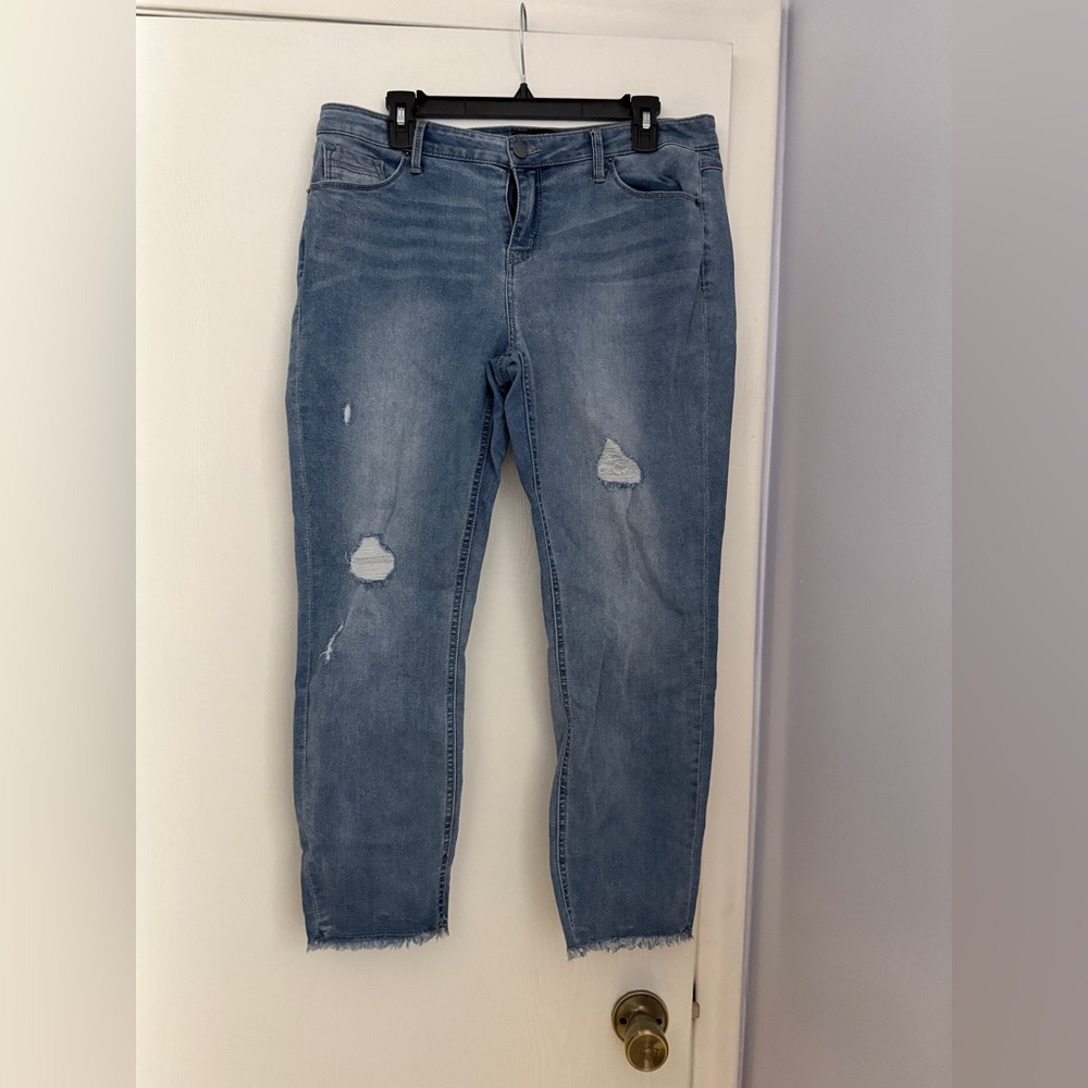 Women’s size 12 Kenneth Cole skinny distressed jeans.